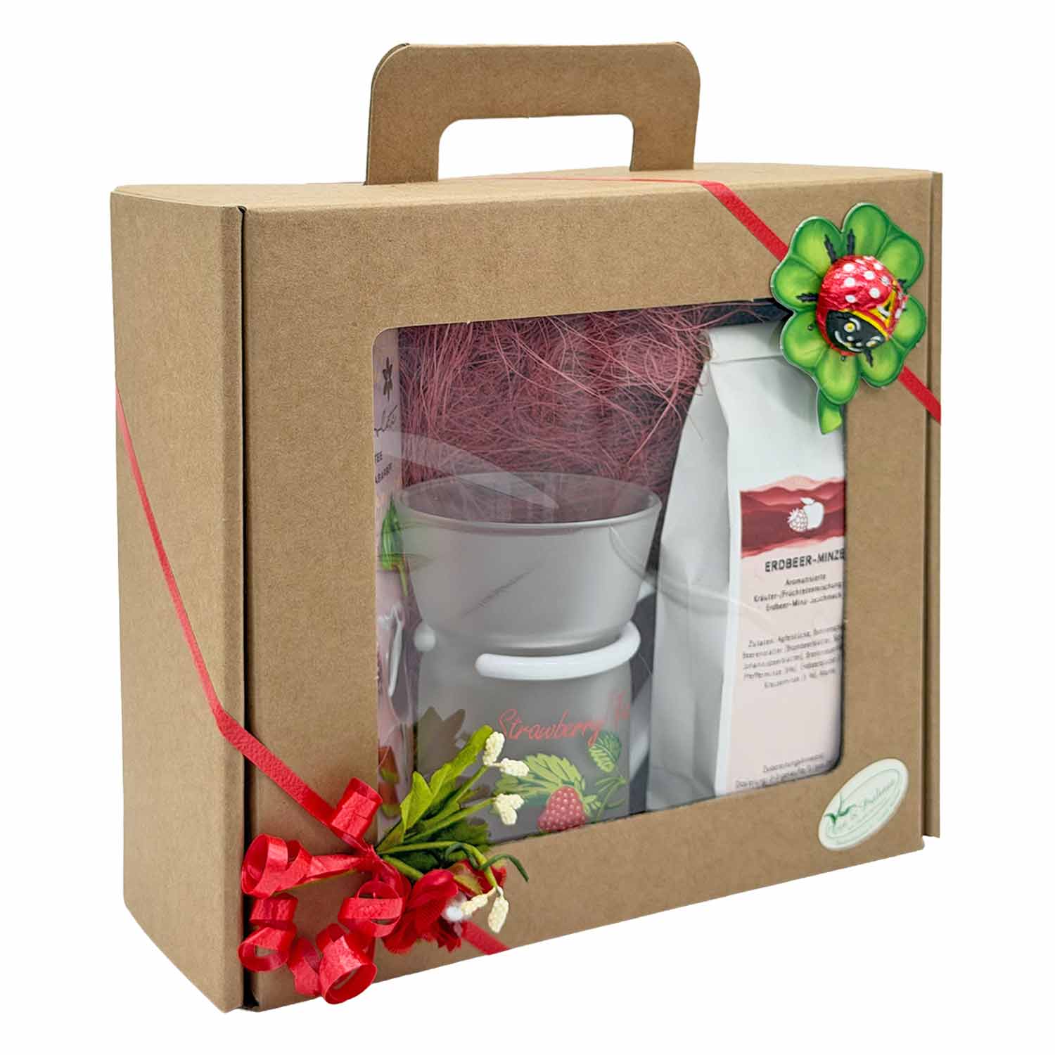 Geschenkbox mit Erdbeer-Minztee, passender Tasse und dekorativem Marienkäfer, perfekt für Teeliebhaber und besondere Anlässe.